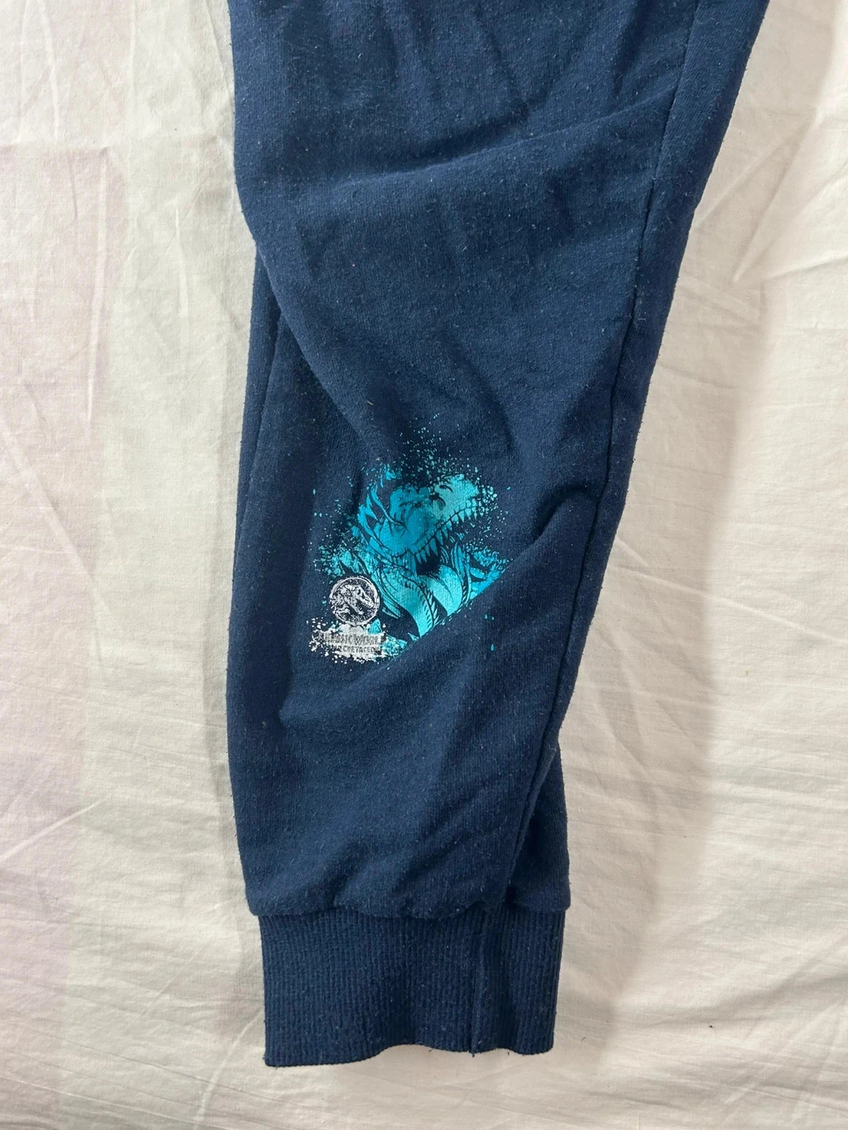 Calça azul marinho jurassic world – photo 5
